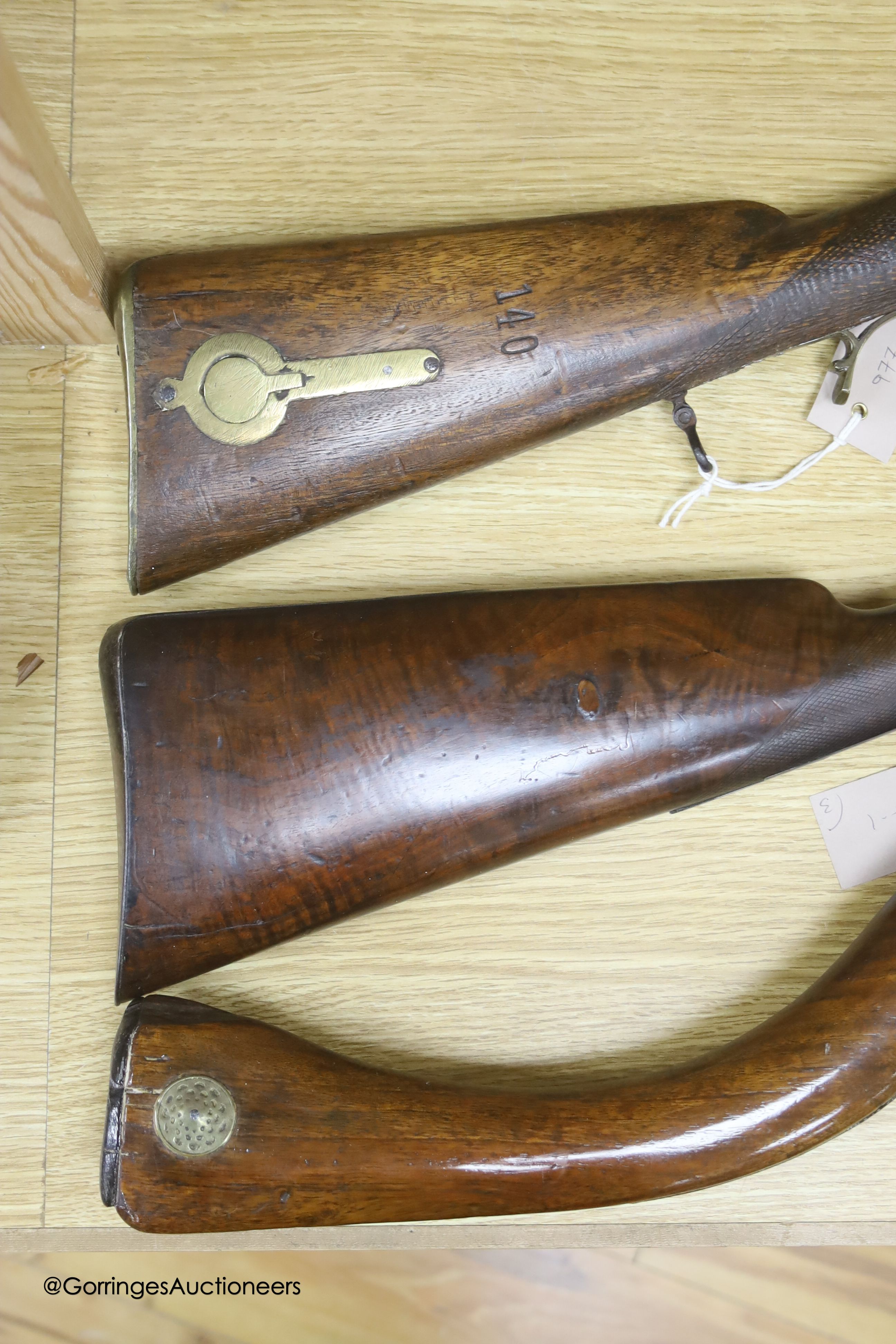 An Indian percussion rifle, an Afghan percussion rifle and a European percussion rifle, longest 140cm